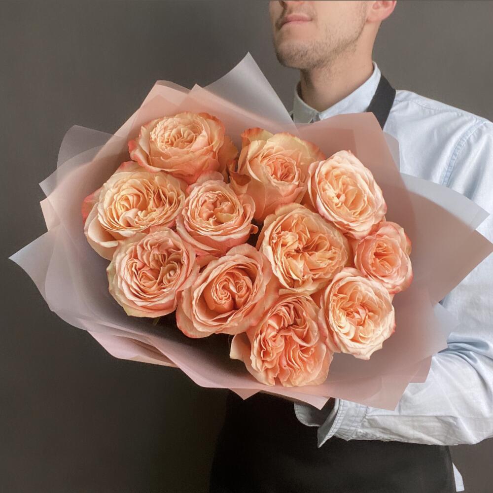 Букет из 11 оранжевых пионовидных роз 